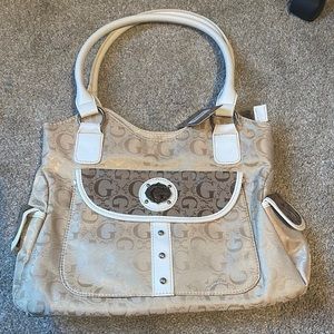 White and tan purse